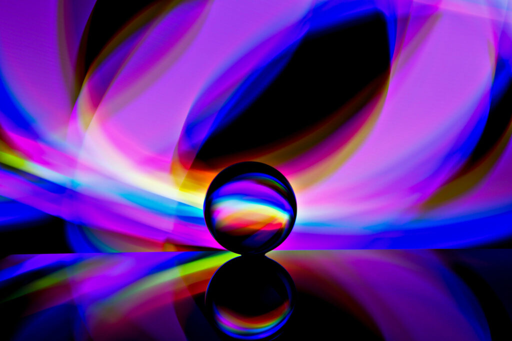 Abstract-background-with-light-reflecting-from-behind-a-glass-ball