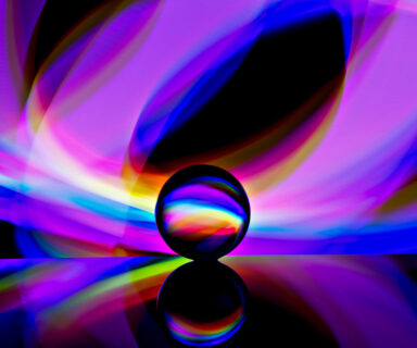 Abstract-background-with-light-reflecting-from-behind-a-glass-ball