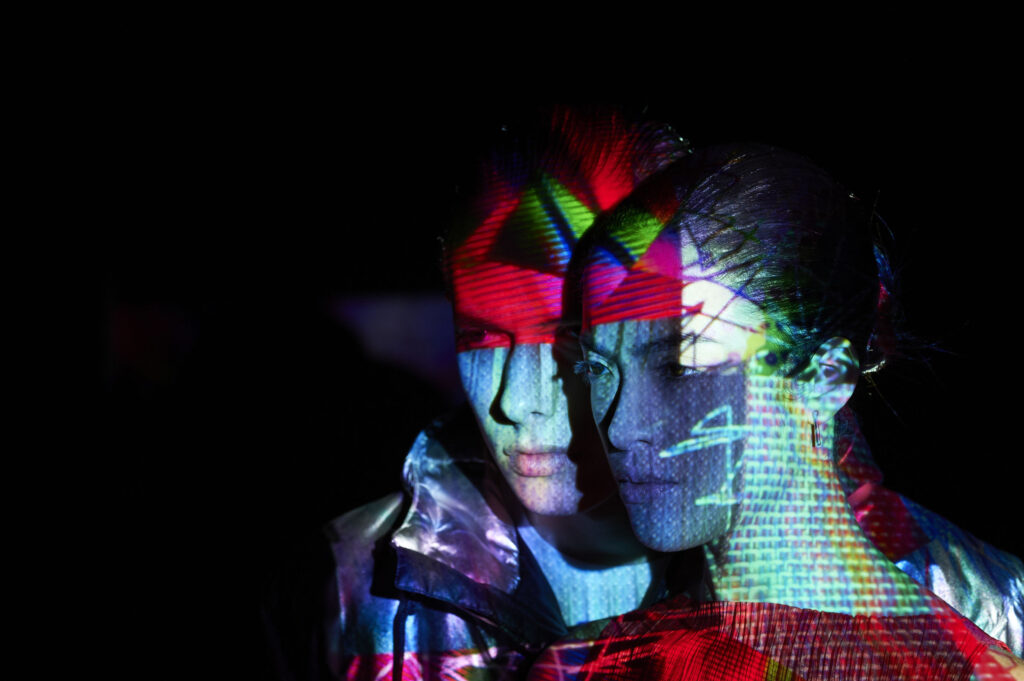 Couple-with-abstract-shapes-across-their-faces