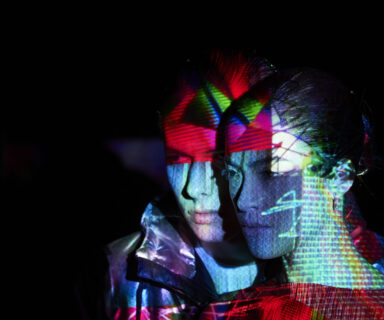 Couple-with-abstract-shapes-across-their-faces