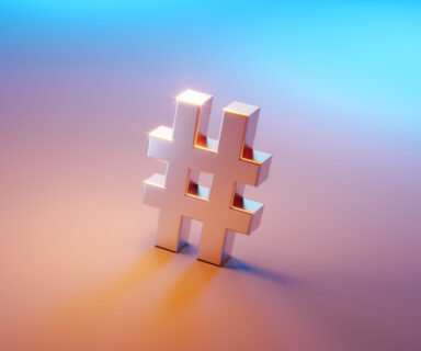 Hashtag-Symbol-Sitting-Over-Pink-And-Blue-Background