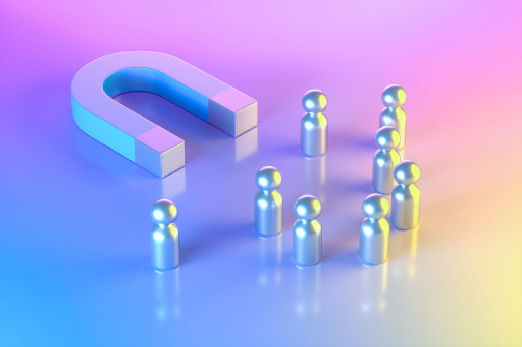 Magnet-with-Group-of-Pawn-People-on-Neon-Lighting-Background-Blue-Pink-Yellow-Colors