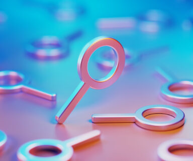 Metallic-Magnifier-Symbols-Illuminated-By-Blue-And-Pink-Lights-On-Blue-And-Pink-Background