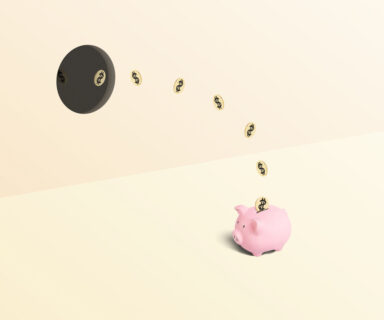 Piggy-bank-being-stuffed-with-money