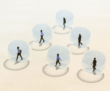 Social Distancing. People walking through the square in a transparent sphere.