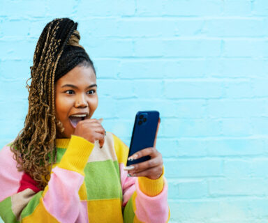 Woman-reacting-to-smart-phone