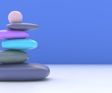 Zen-stones-smooth-pebbles-pyramid-stacked-balance-on-blue-wall-background.-3d-illustration