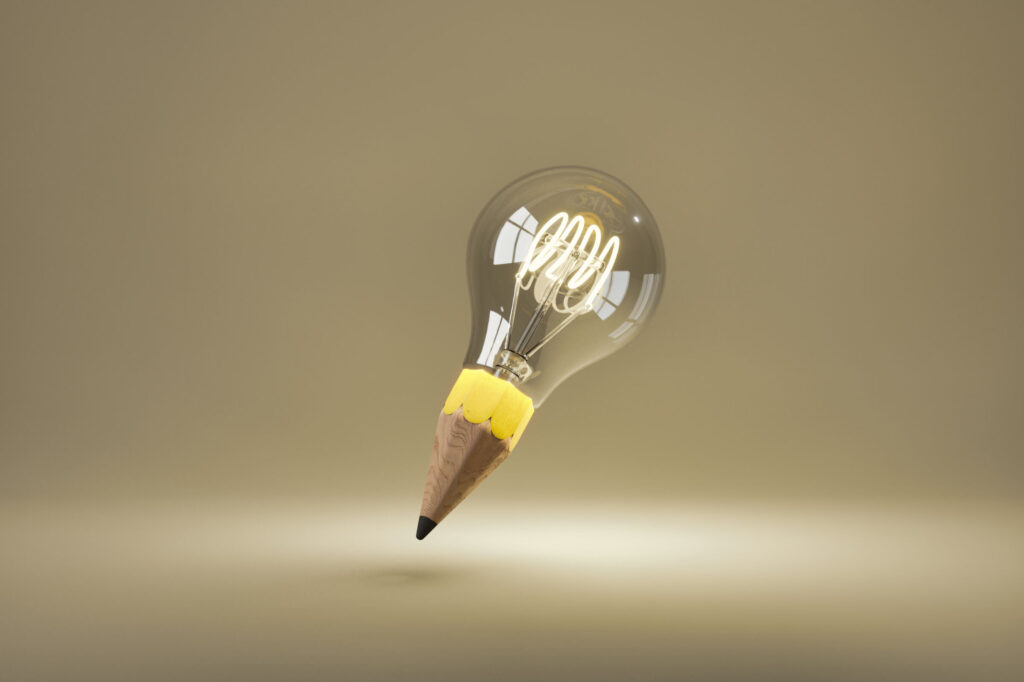 light-bulb-illuminated-with-pencil-tip