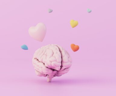 the concept of falling in love. the brain over which multi-colored hearts fly on a pastel background. 3D render